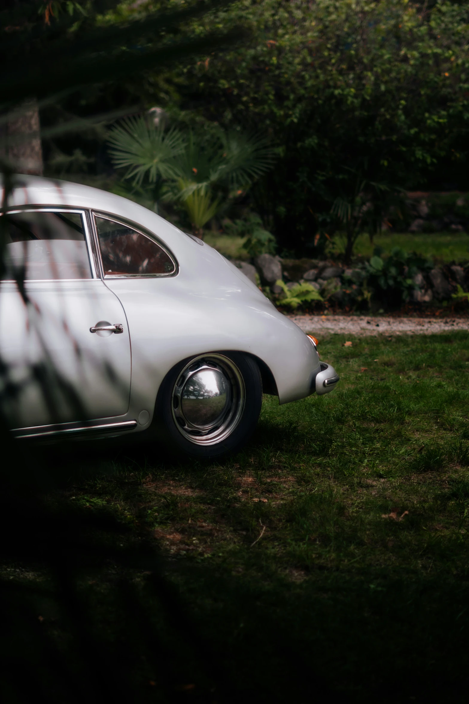 a white car parked on the side of the road