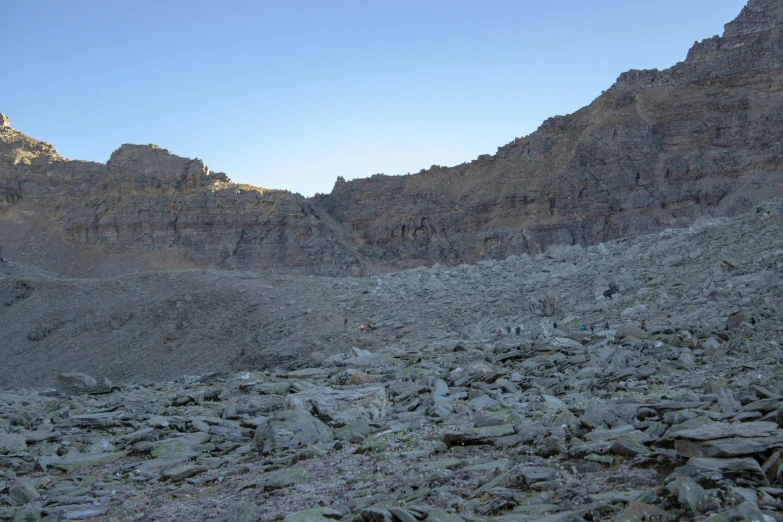 the rocky mountains are filled with rocks and moss