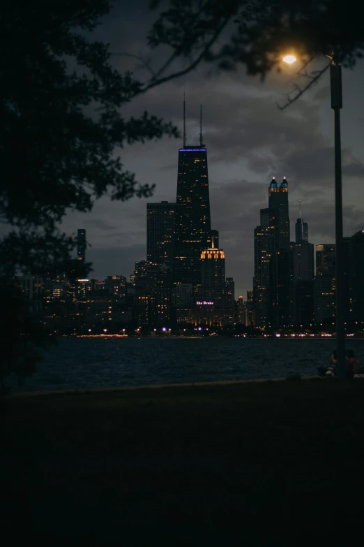 the view of a city lit up at night