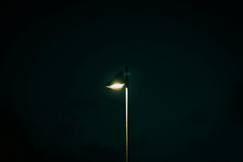 a street light that is illuminated in the dark