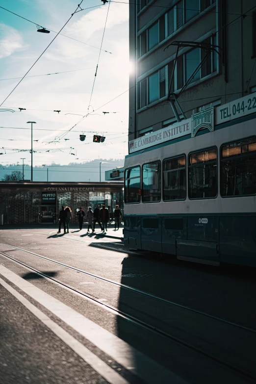 a train coming down the tracks in the early evening hours