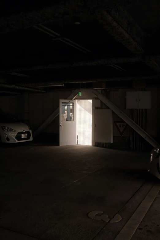 a car is parked in an underground garage