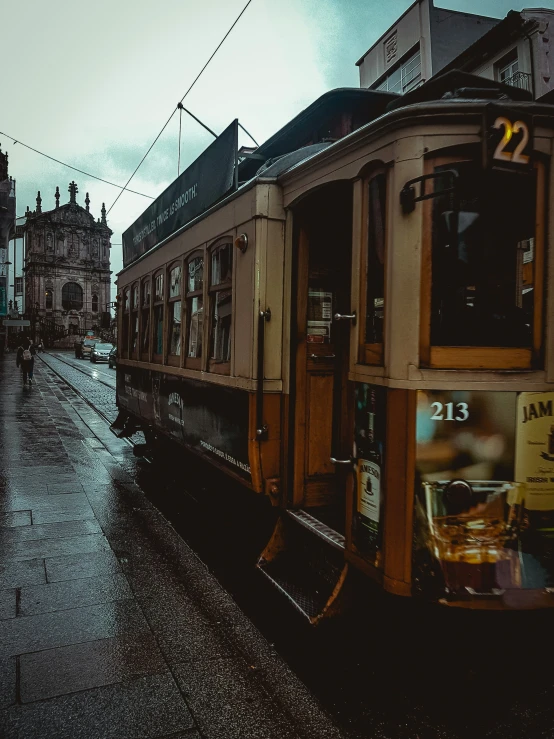 a street with parked cars and a sidewalk