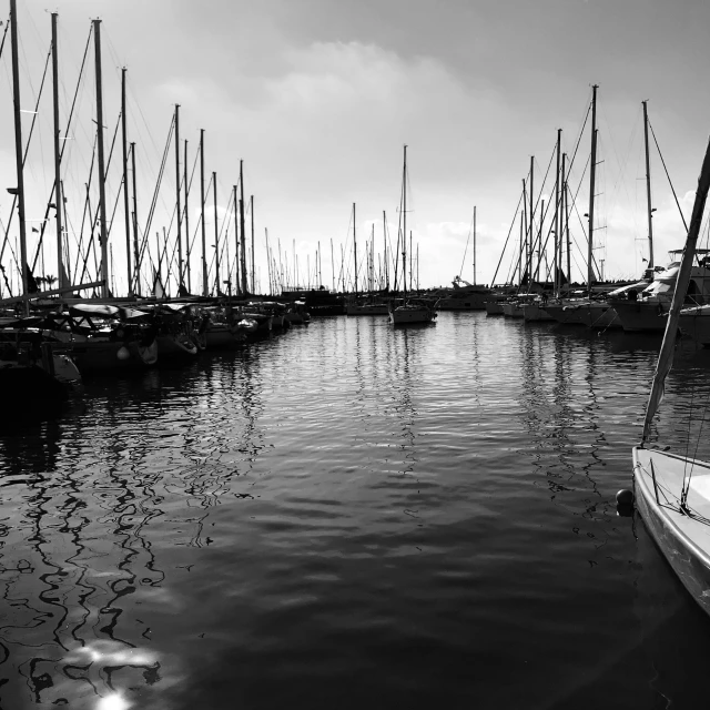 a lot of boats sitting together in the water