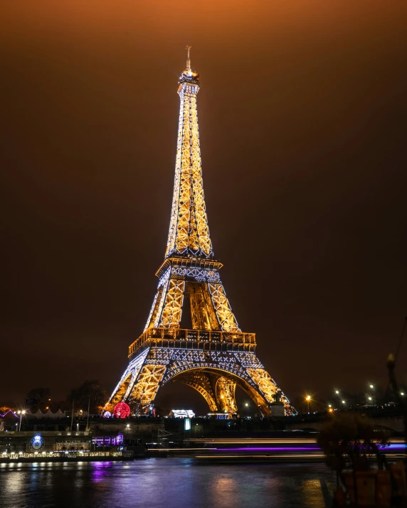 the illuminated eiffel tower is located in paris, france