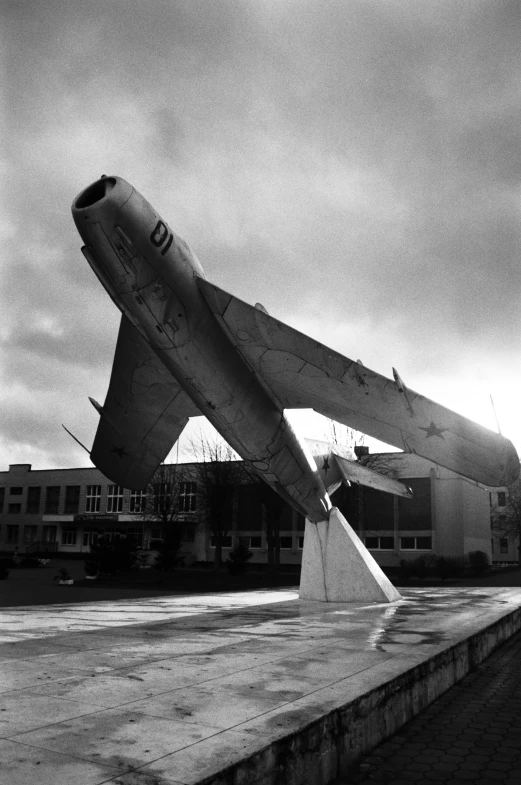 an airplane is sitting outside in the dark