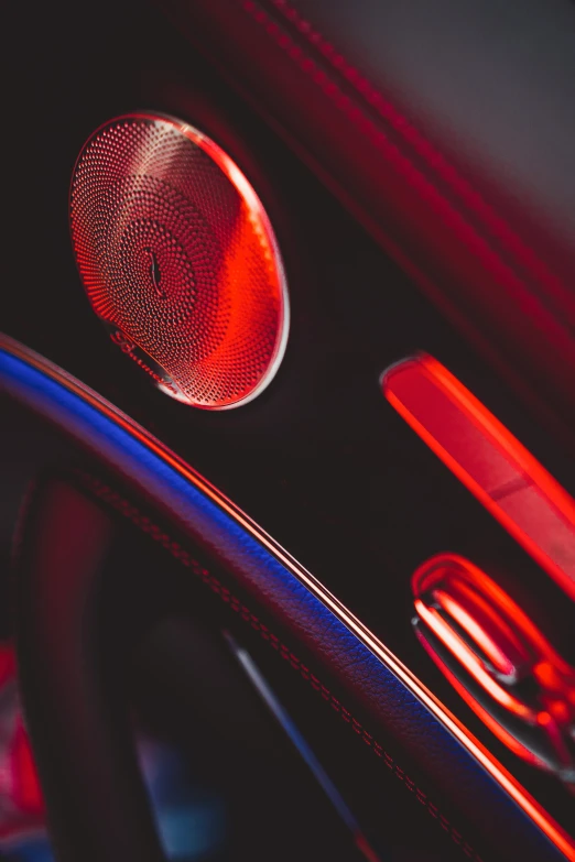 a car dashboard with a radio and speaker