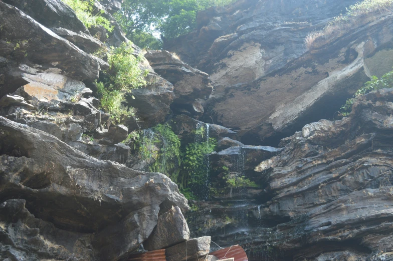 an image of a rocky landscape with benches