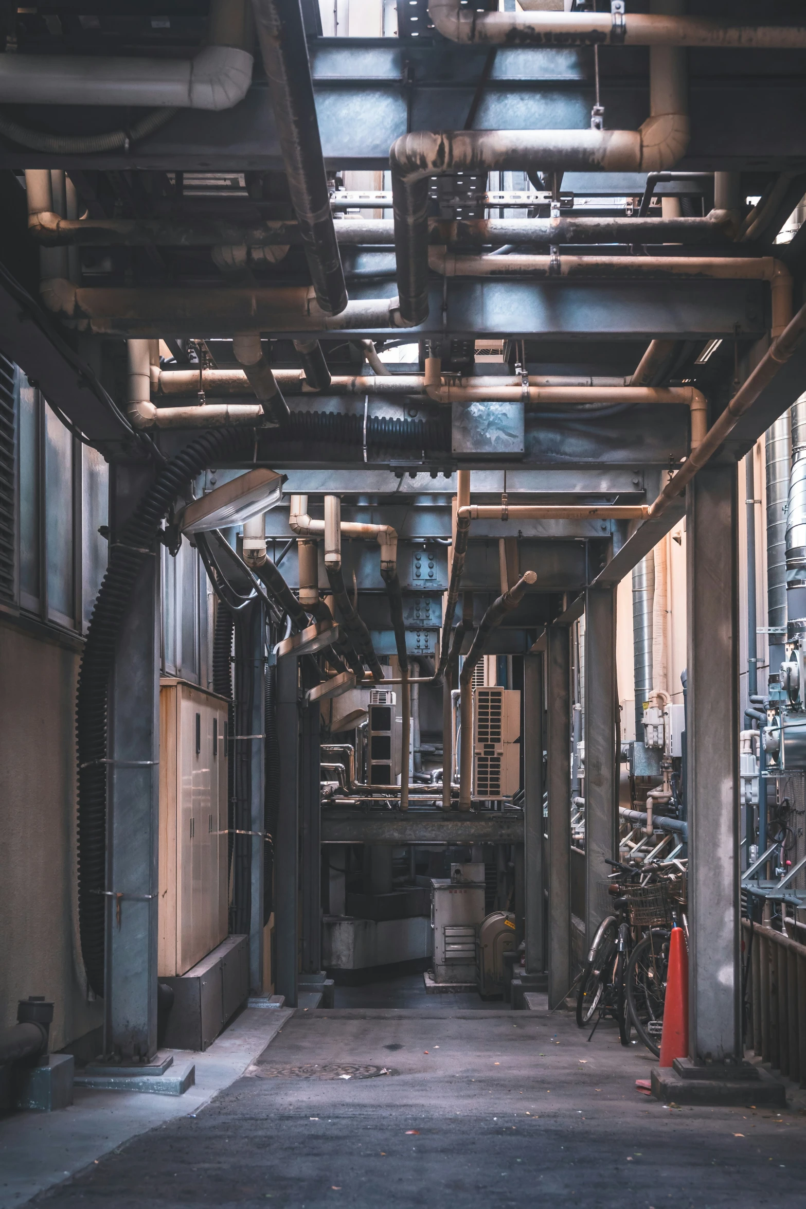 a building with pipes and machines inside it