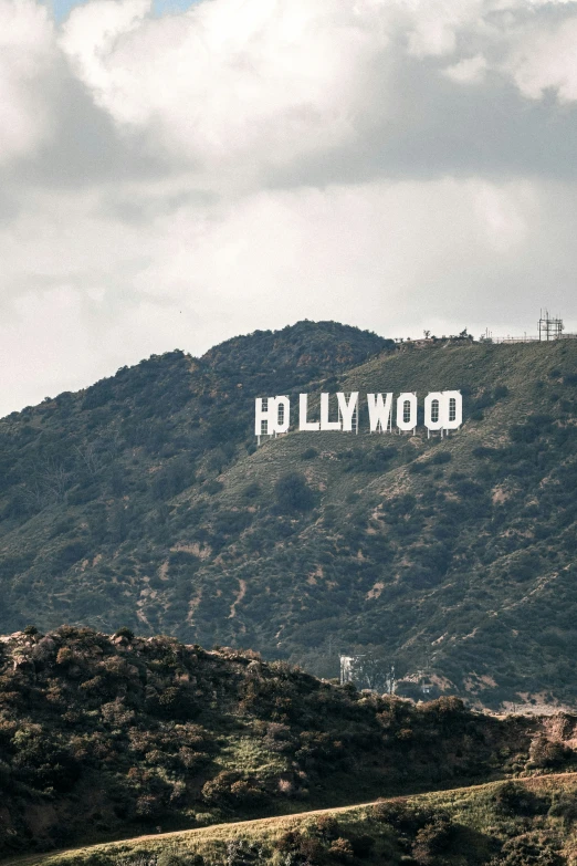 hollywood atop a hill surrounded by mountains