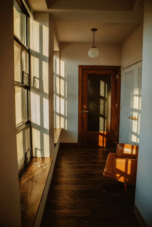 the sun is shining through the windows on the house