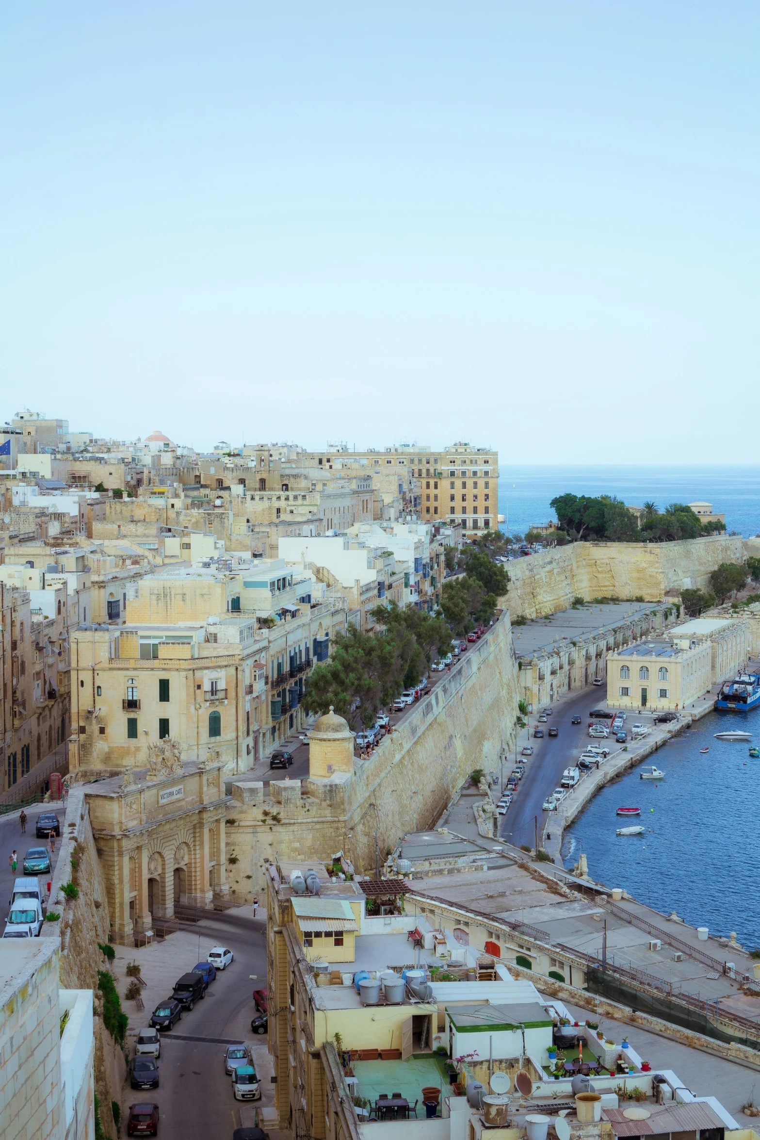 a view of an old city near water