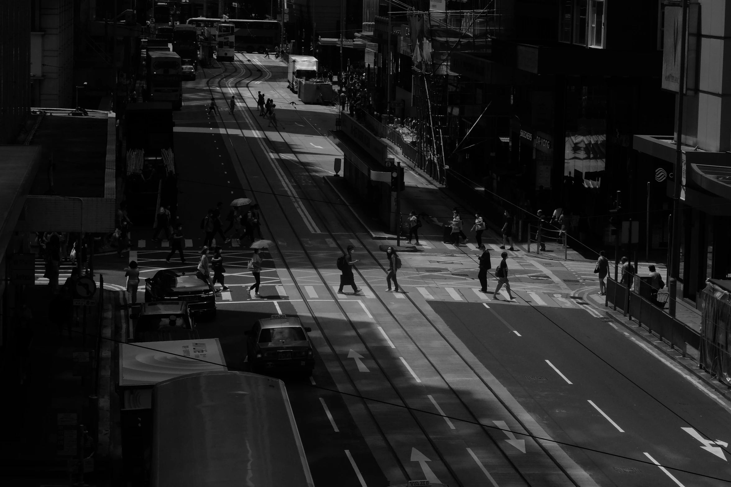 a city street filled with people and buildings