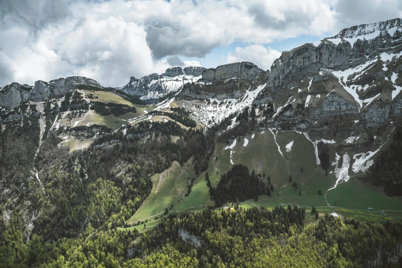 the mountains in the distance are covered with snow