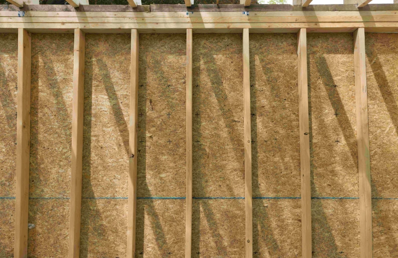 wooden walls and wooden slats in the process of construction