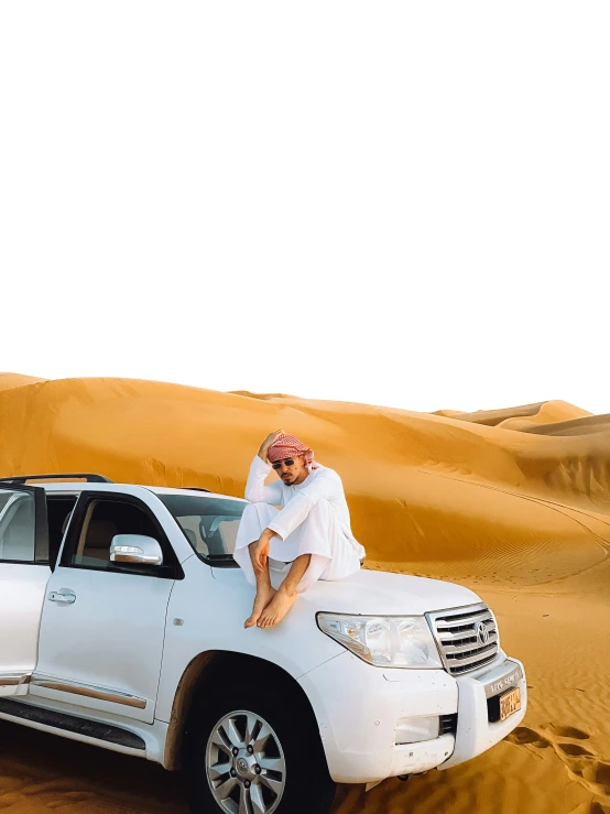 a woman sitting on the roof of her suv