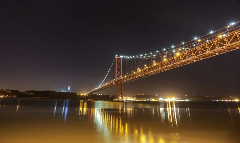 a very long and big bridge over some water