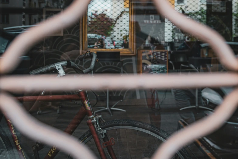 some bikes and chairs inside a shop