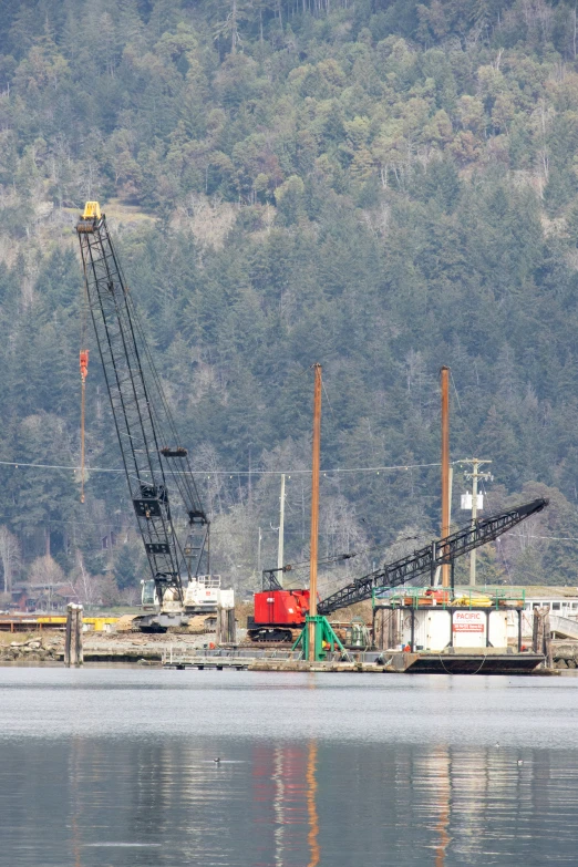 a barge sitting on the water next to some docks