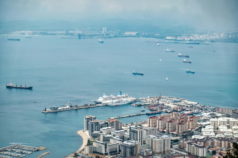 the city is surrounded by boats and other buildings