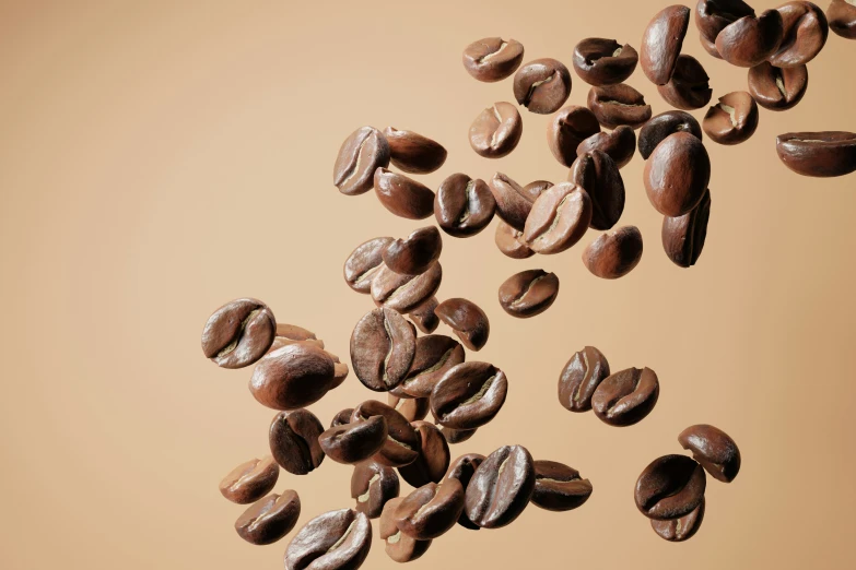 a pile of coffee beans on top of a table