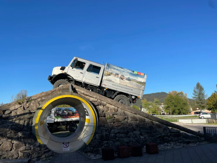 a truck is driving down some stairs