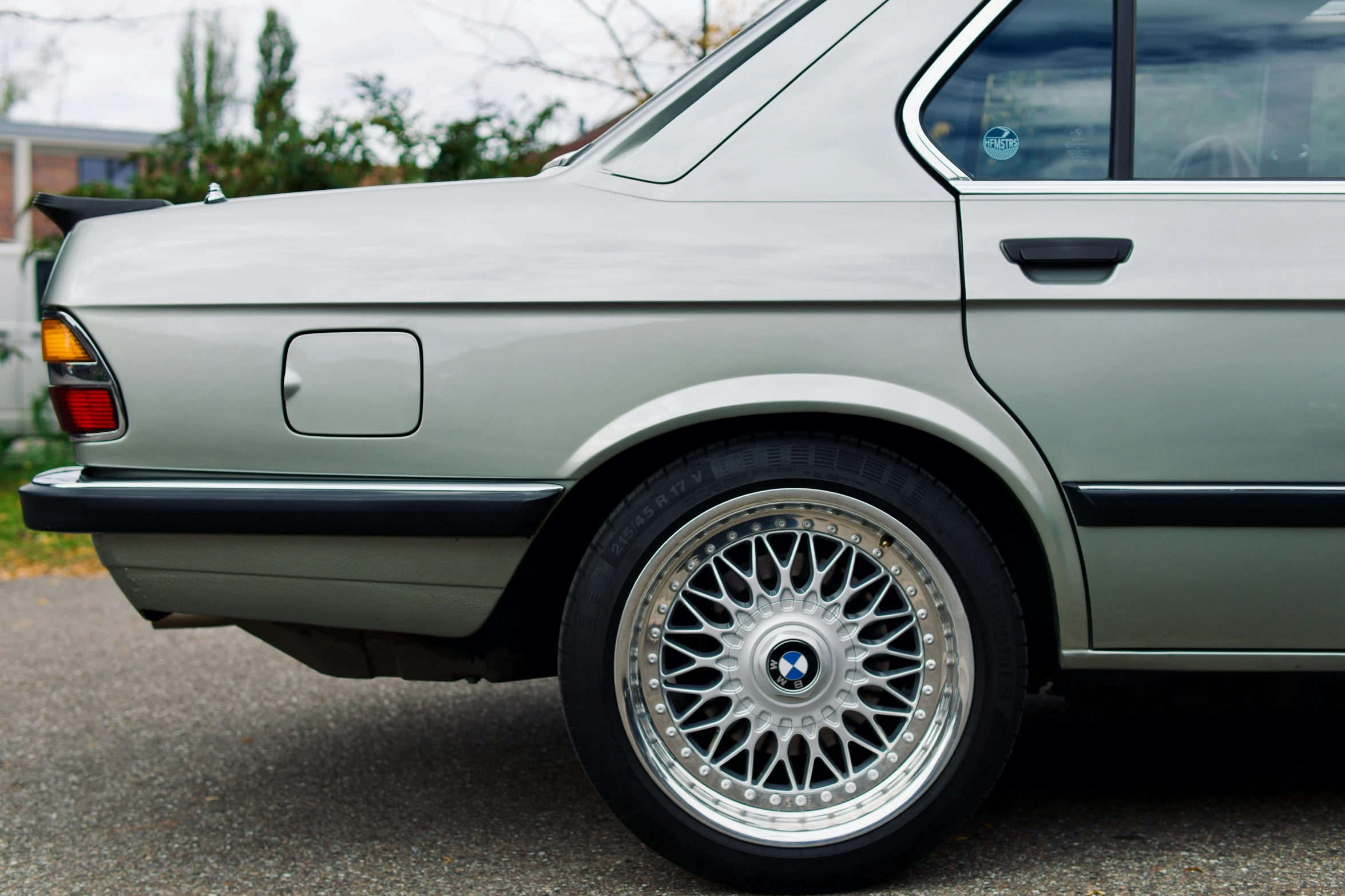 a close up of a car that is parked in a lot