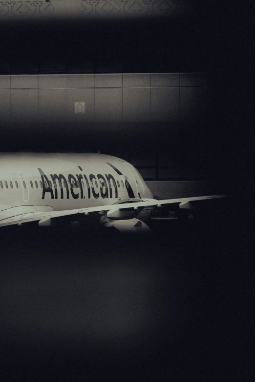 an airplane is parked at the airport runway