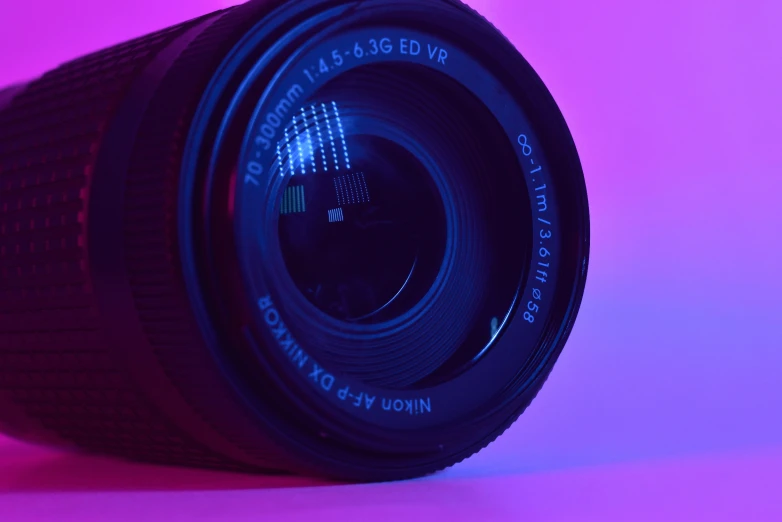 a close up view of an illuminated lens