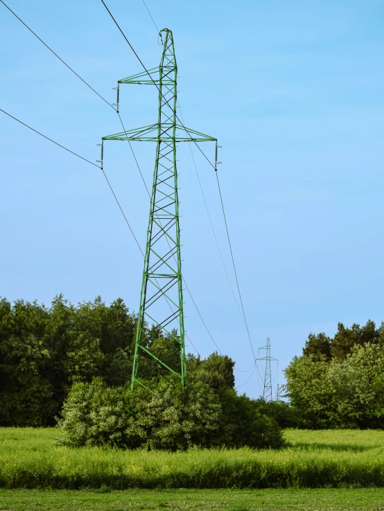 a tower that is sitting next to trees