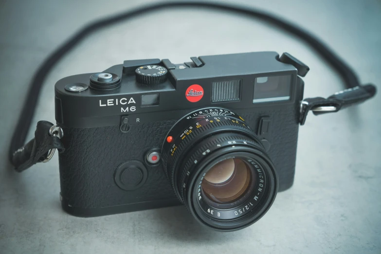 a black leica is laying on the floor