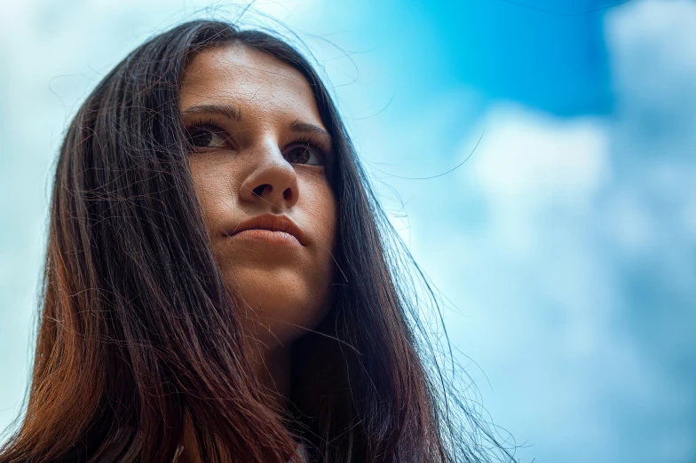 a close up s of a women with long hair