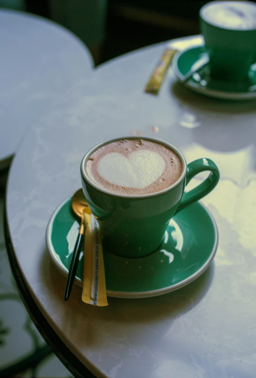 a cup of coffee sitting on top of a saucer