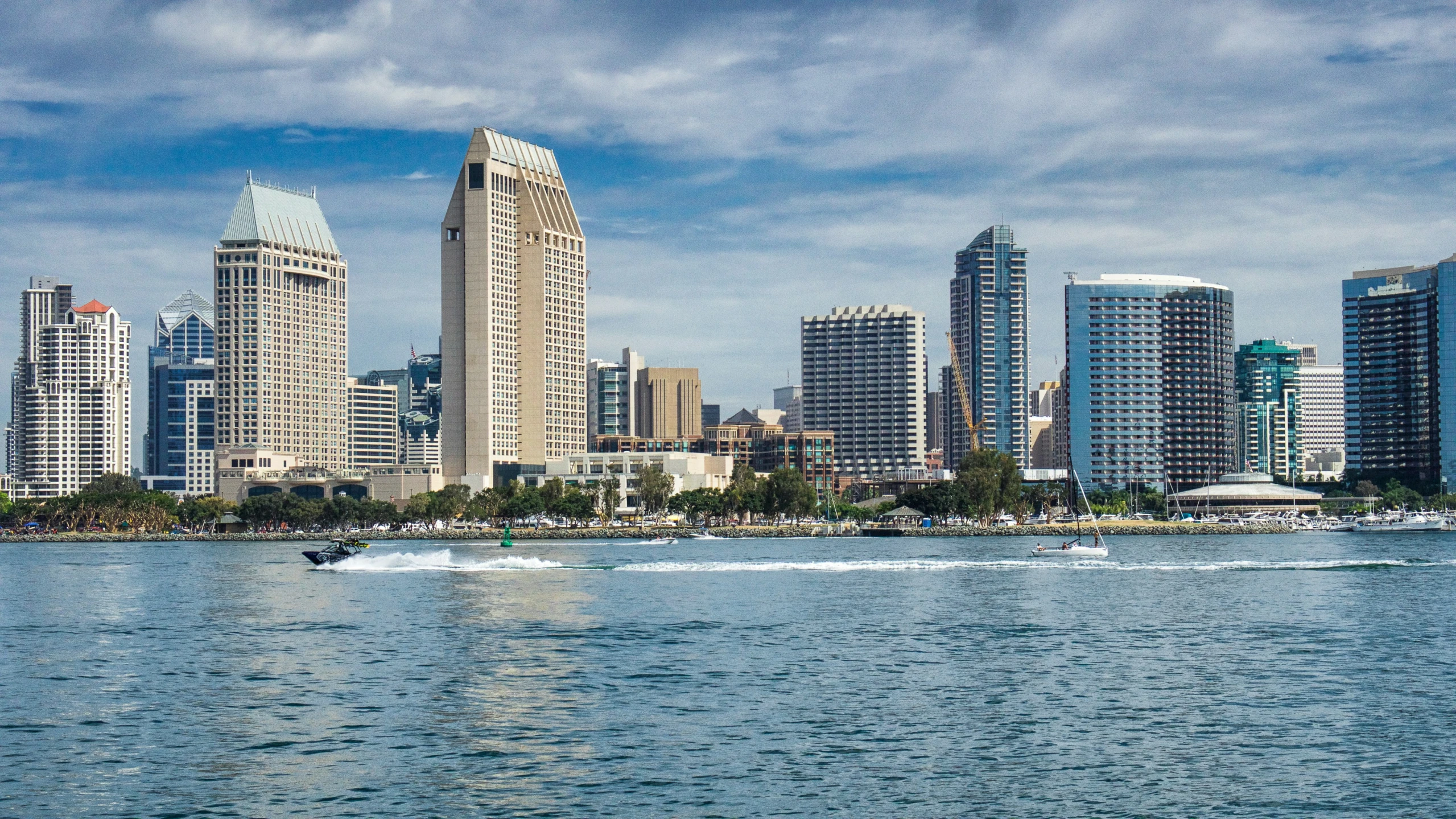 a city with lots of tall buildings in the distance