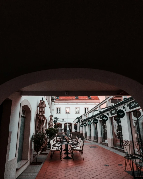 a large archway is at the entrance to a restaurant