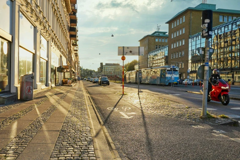 a sidewalk is shown next to an empty street