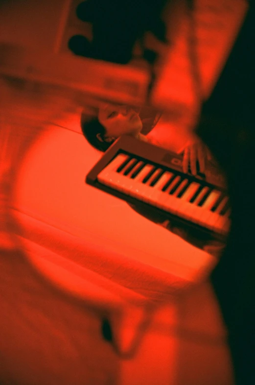 a person that is playing piano on a stage