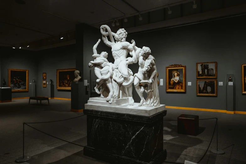 many paintings and sculptures are on display in this museum