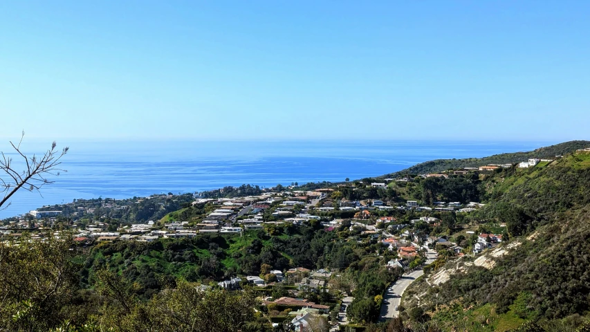 the view over a town from a mountain