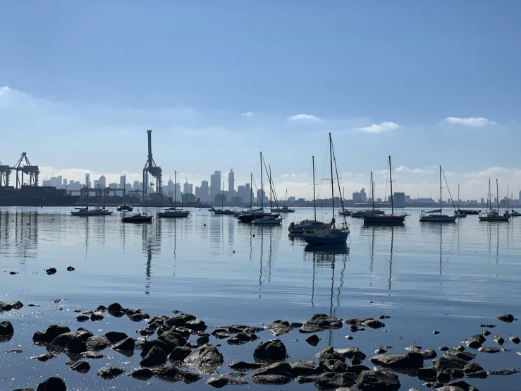 a large body of water with boats floating in it