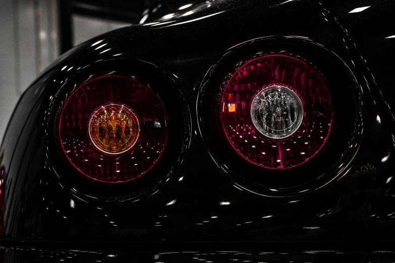 a close up of a car's tail lights