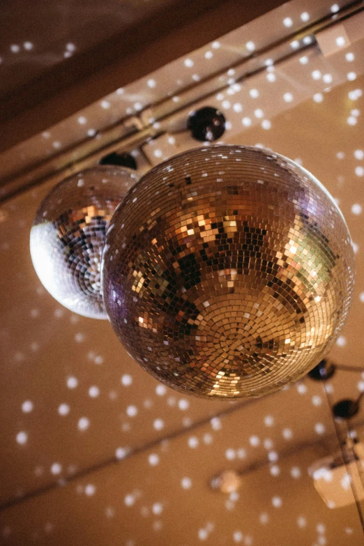 the disco ball is hanging upside down