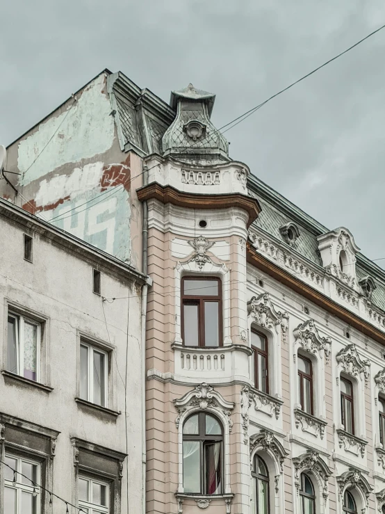 an old, run down building that has a lot of windows on it