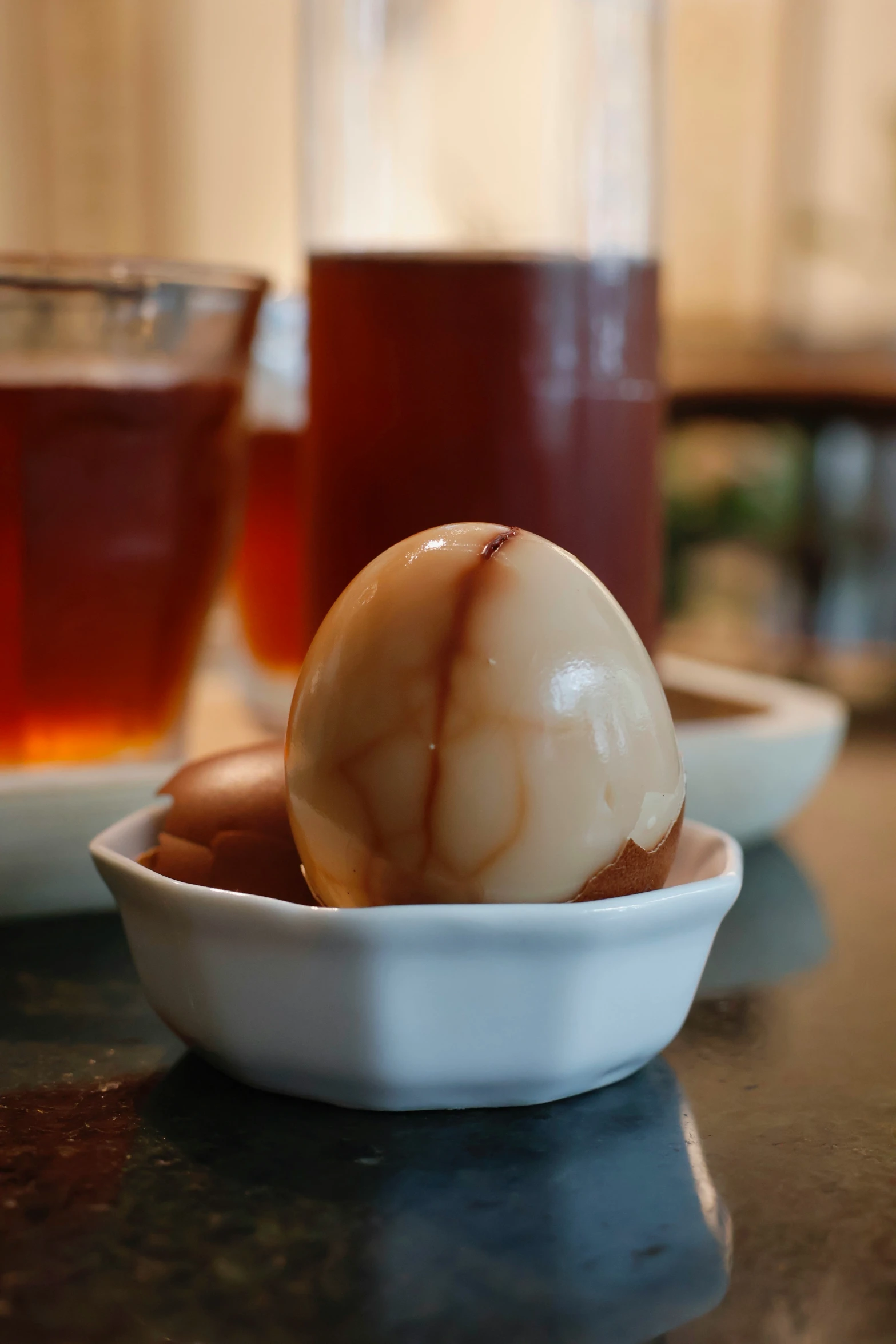 an item that looks like a hard boiled egg in a bowl