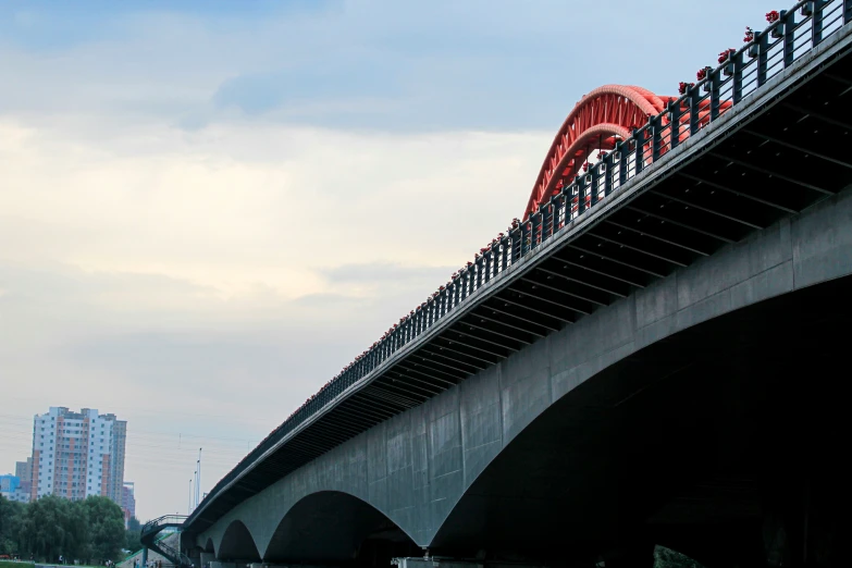 a bridge over the water with people on it