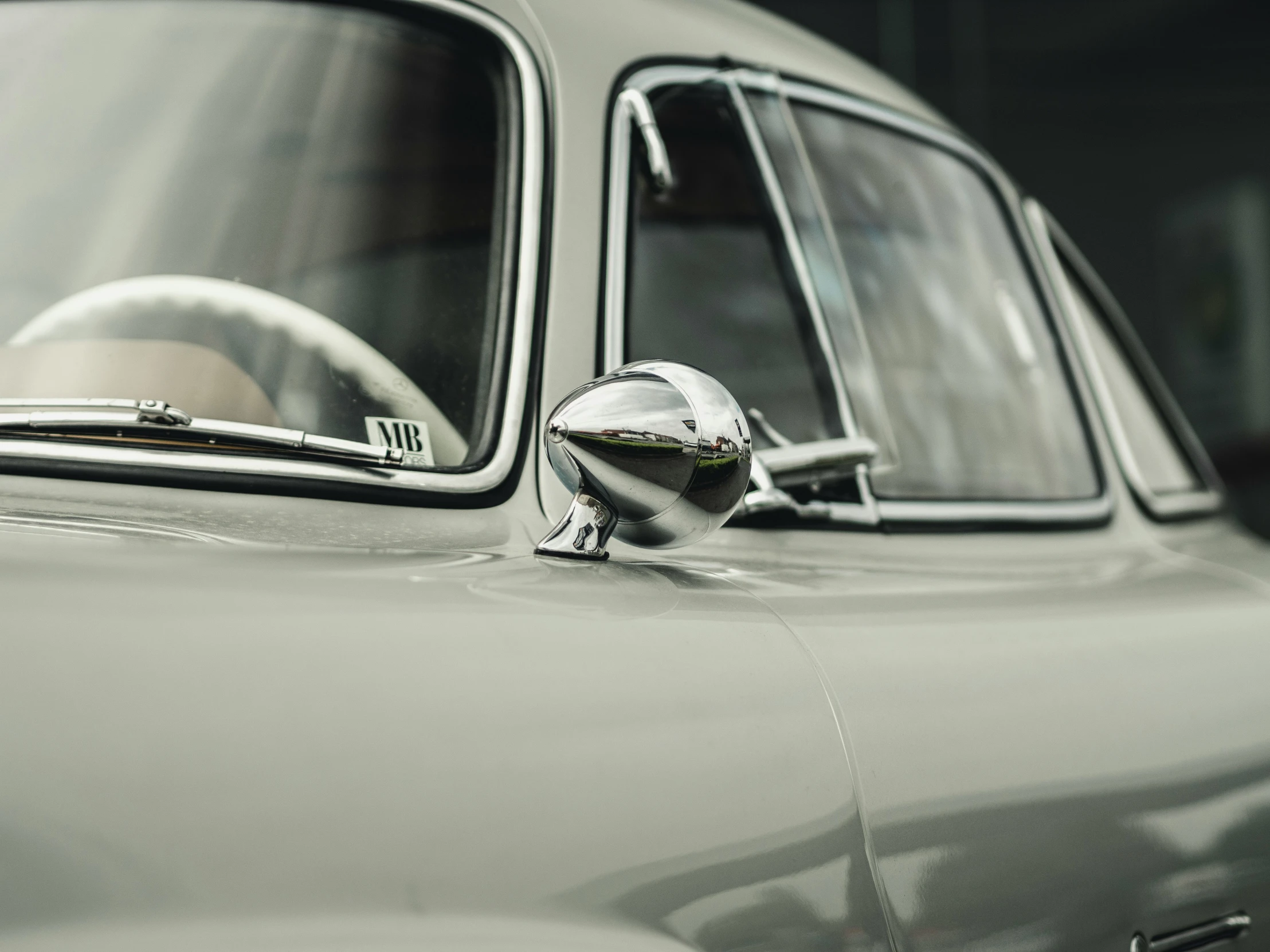 a close up of a reflection in a car mirror