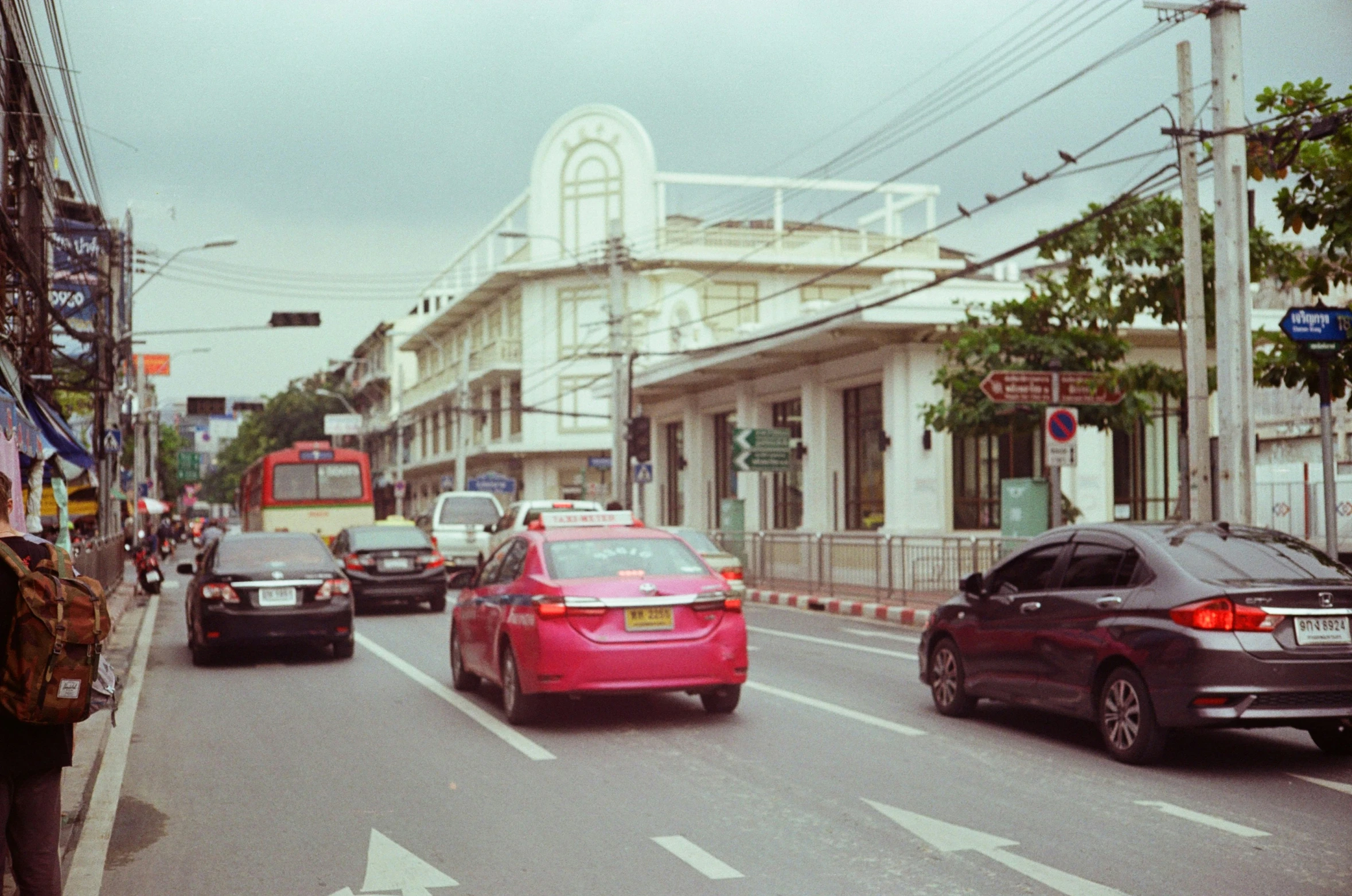 the car is red on this city street