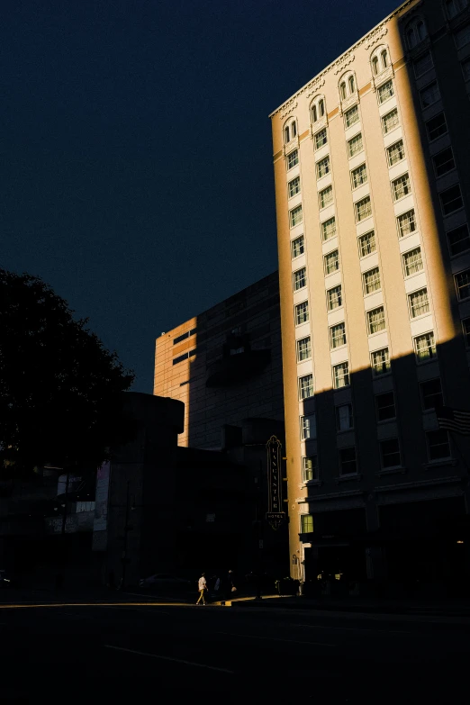 a large building sitting in the middle of a street