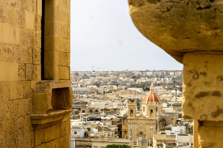 a view of a city from an old building