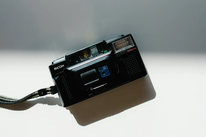 an old fashioned radio with a long cord